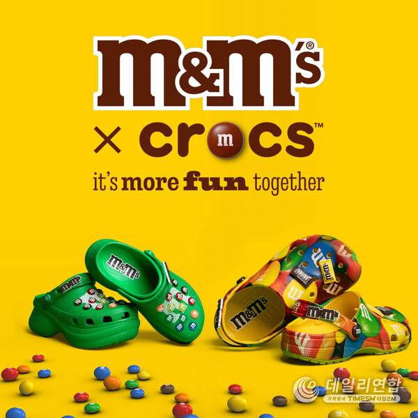 M&M'S and Crocs introduce the first-ever collaboration between both brands, bringing two worlds together in a swirl of flavor and fashion to surprise and delight fans — because “It’s More Fun Together.” M&M'S and Crocs introduce the first-ever collaboration between both brands, bringing two worlds together in a swirl of flavor and fashion to surprise and delight fans — because “It’s More Fun Together.”