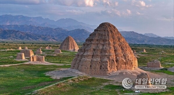 A drone photo taken on July 10, 2025 shows two Xixia imperial tombs in northwest China's Ningxia Hui Autonomous Region. (By Wang Peng)